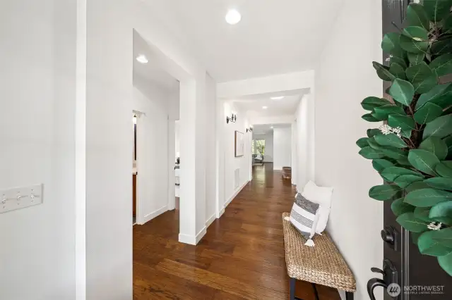 Entry way with the two guest bedrooms and full bath to the left