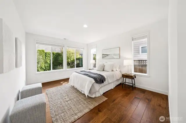 Oversized Primary Suite with wood floors