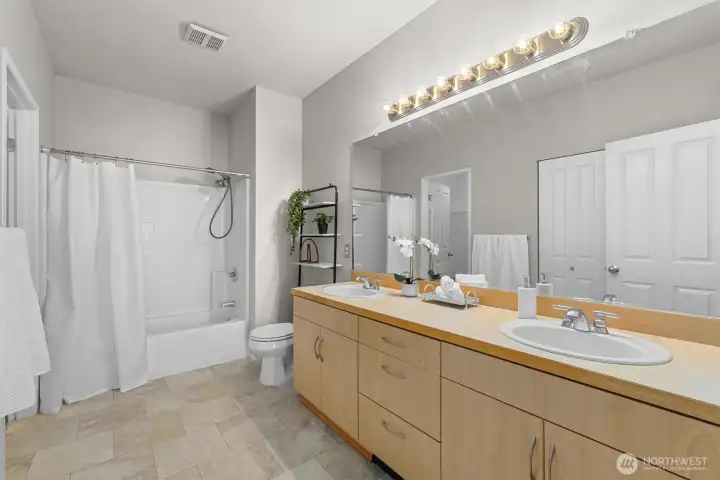 Primary ensuite bath with dual vanities