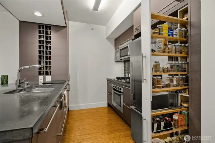 A clever use of space. A pull out spice rack.