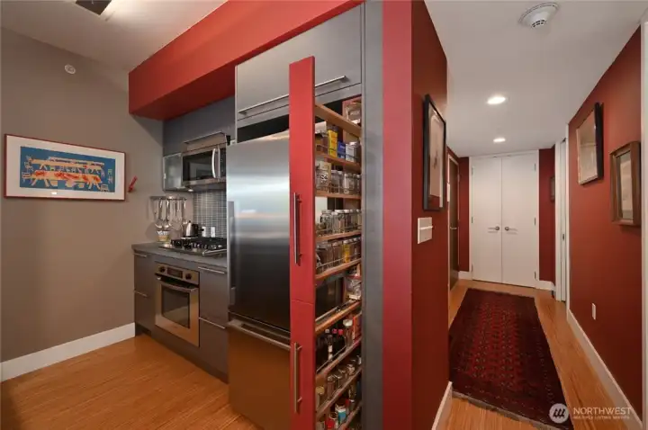 Clever use of space. A pull out spice rack.