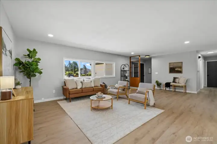 Light-filled living room with brand-new LVP flooring and modern finishes