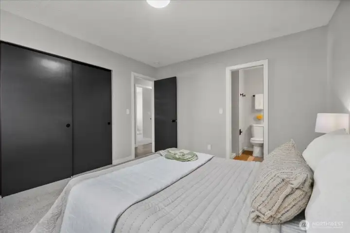 Large primary bedroom designed for rest and relaxation