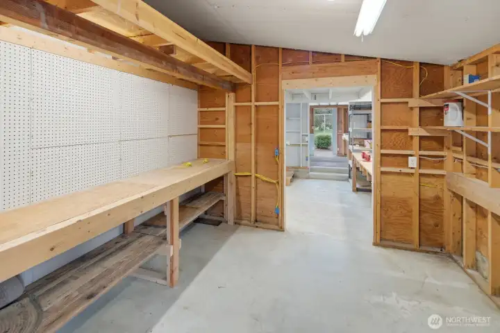 Complete with 3 work benches and cement floors