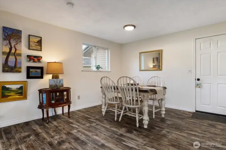 Dining room off of kitchen connects to living room.