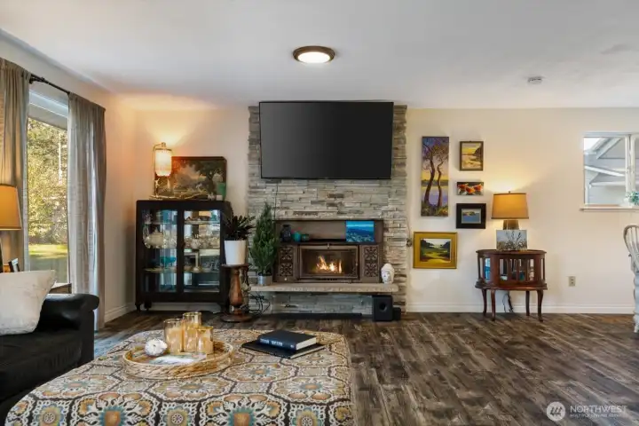 Glass sliding door provides access to spacious backyard.