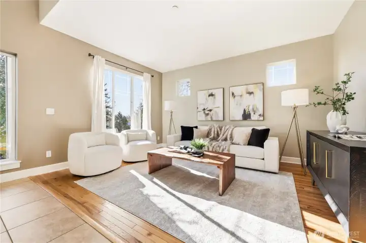 Step inside to the light-filled front living room and be greeted by a vaulted foyer and seamless flow into the rest of the home