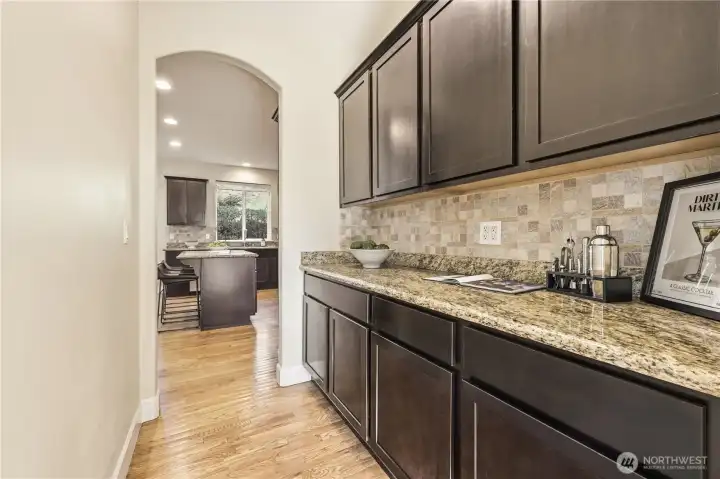 The butler's pantry off of the kitchen is a rare yet highly functional addition, providing even more storage and easy access to the front dining room