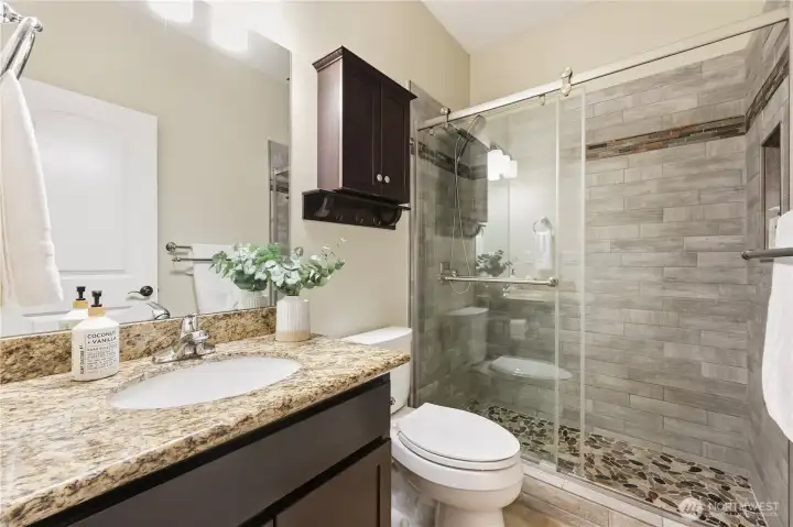 The main floor also features a 3/4 bathroom