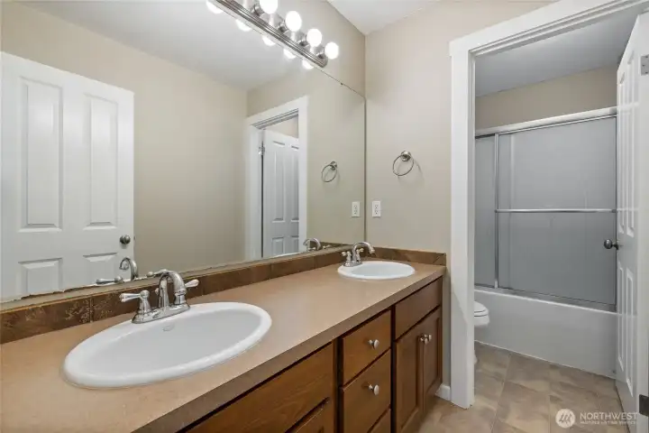 Hall bath has dual sinks