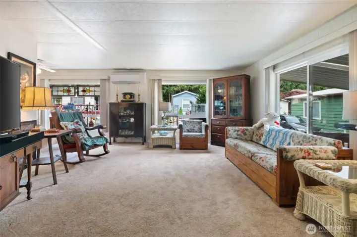 3 picture windows in the Living Room give off lot of light.