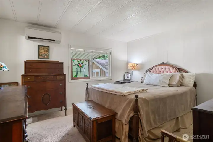 Primary bedroom with walk-in closet