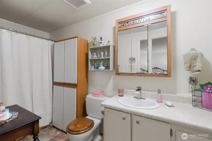 Primary full Bathroom with shower and tub.