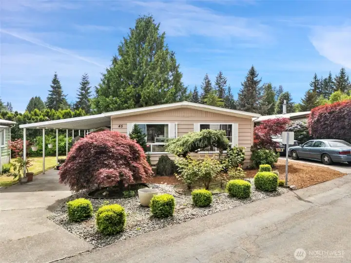 Front of the home with view of carport