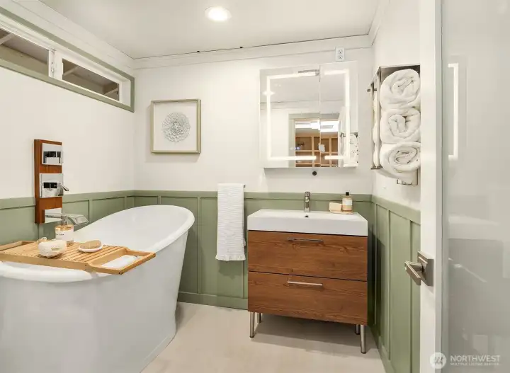 Primary Bath with soaking tub and heated floors. Primary Bath with soaking tub and heated floors.