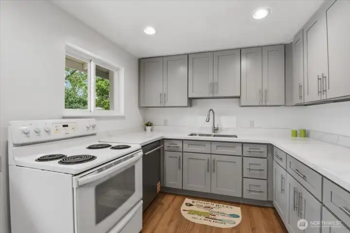 There's a view to the serene backyard from the kitchen through its west-facing window.