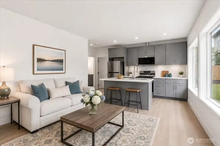 The DADU offers an open-concept living room that easily flows into the kitchen.