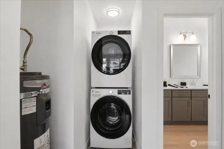 The DADU offers the same full-size stackable Whirlpool washer and dryer that is found in the main home. All appliances convey in both homes.