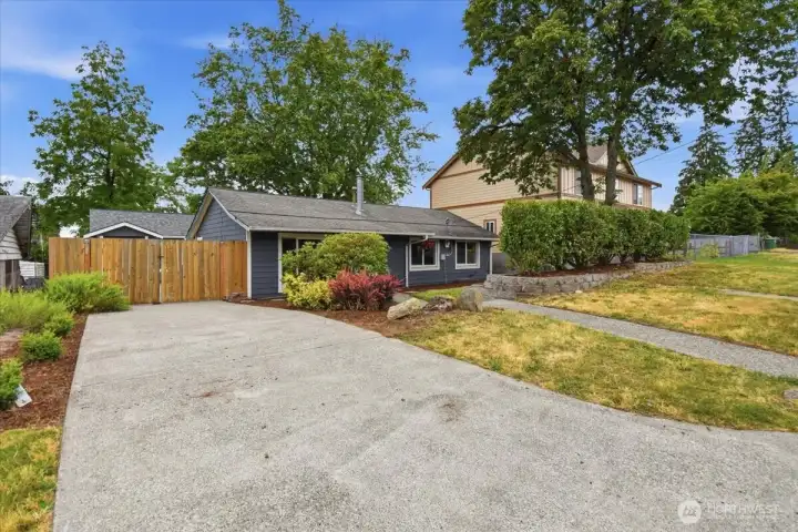 More driveway in the front of the property.
