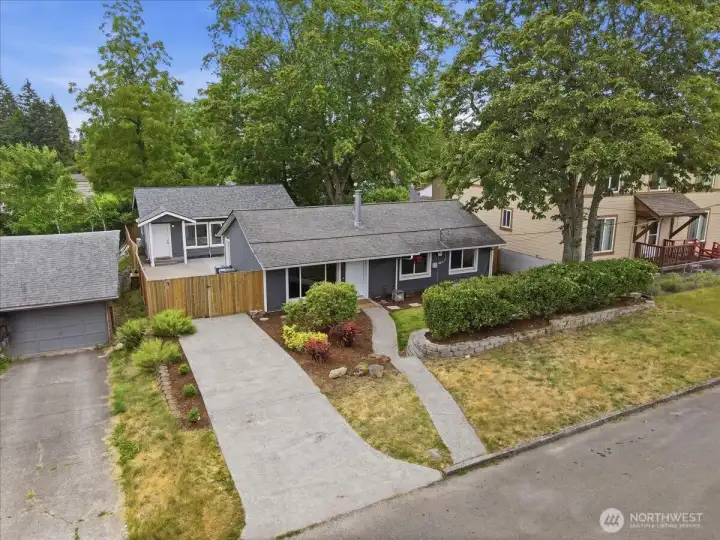 This drone shot shows how the two homes compliment one another and offer great street appeal.