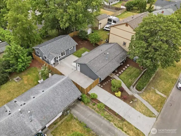 This image shows how the DADU is positioned in the southwest corner of the property to create as much distance between the houses as possible. Come see what you think!