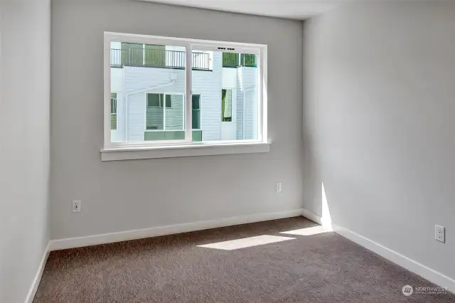 Photo of a previously built unit. Same floorplan, potential differences in color scheme.