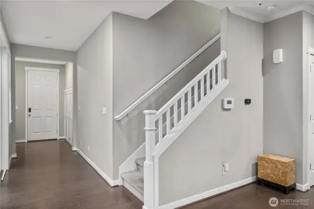 Stairs up to landing flex space, utility room and bedrooms