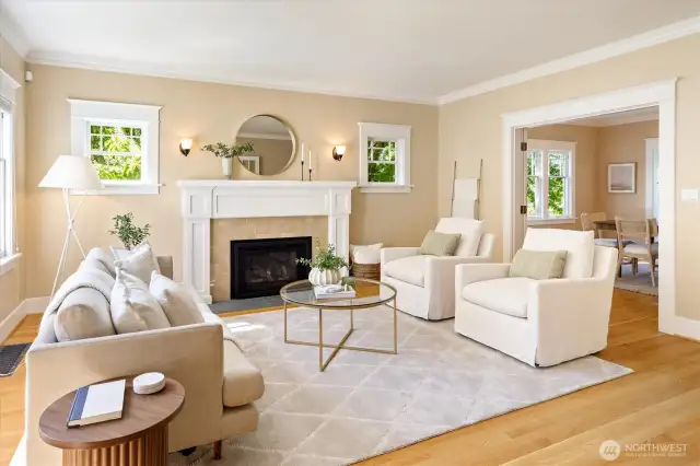 Living room looking through open French doors to dining room