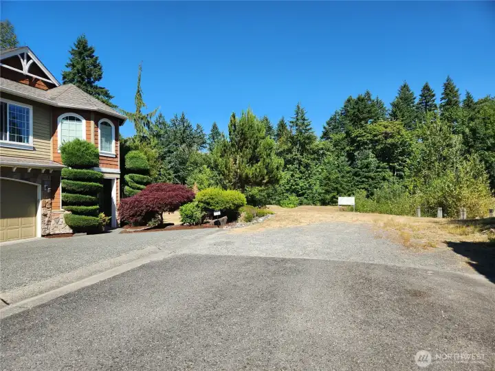 SW corner is NW of retention pond