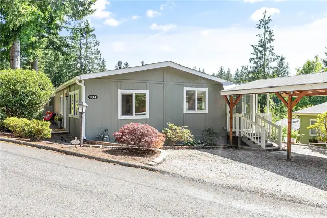 Easy walkway to front door - or use the door from the newer carport!