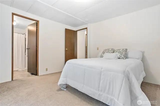 Primary with view of door into primary bathroom