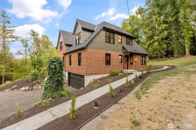 1930s charm combined with modern updates including a brand new roof, gutters, plumbing, and more!