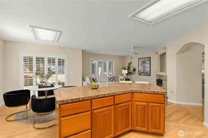 Island Kitchen and Breakfast Nook with backyard views