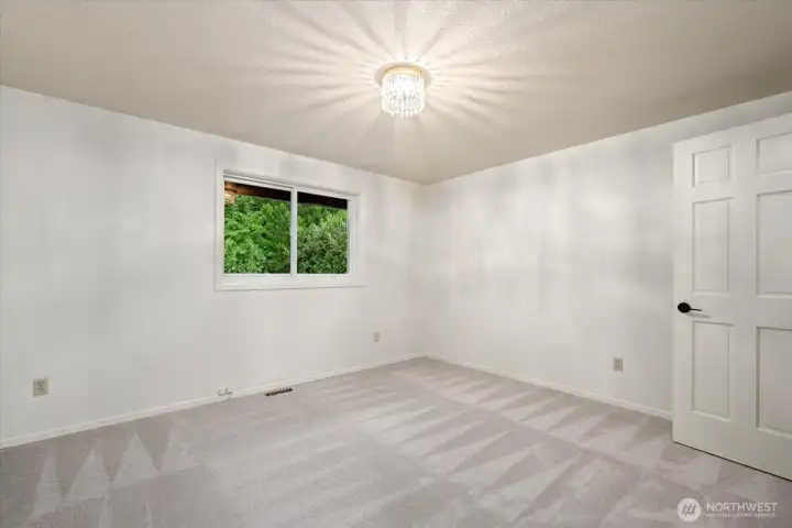 3rd large BR upstairs with view to lush yard