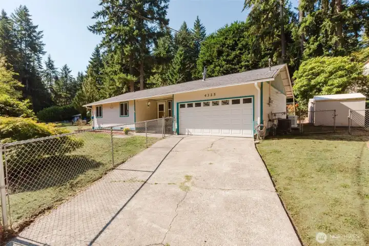 Welcome! Rambler on .25-acre Illahee neigh-  borhood.