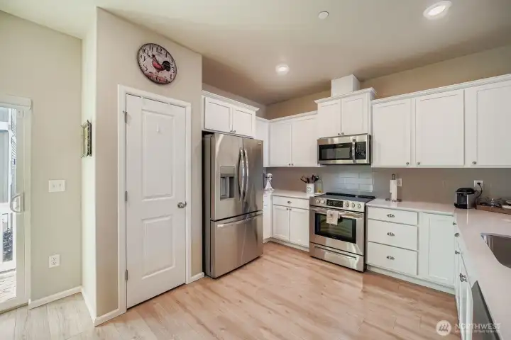 Pantry also found within kitchen.