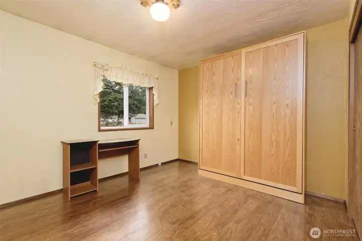 The second bedroom with a Murphy bed that will stay!  Easily converts from an office by day, to a bedroom by night!