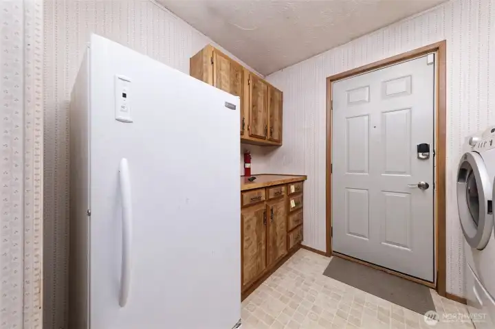 Utility room  - freezer isn't working right and will be removed.