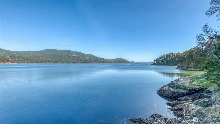 Looking south down Eastsound towards Blakely Island. The meandering coastline makes for an interesting view. The next cove over is Judd Cove. By road, Judd Cove Preserve with hiking trail, beach and historic kiln is less than a 1/2 mile away.