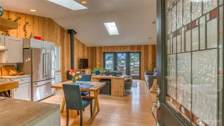 The home has been transformed into a cozy yet modern space. In addition to new kitchen and cedar paneling, the floors - a laminate wood - are new.