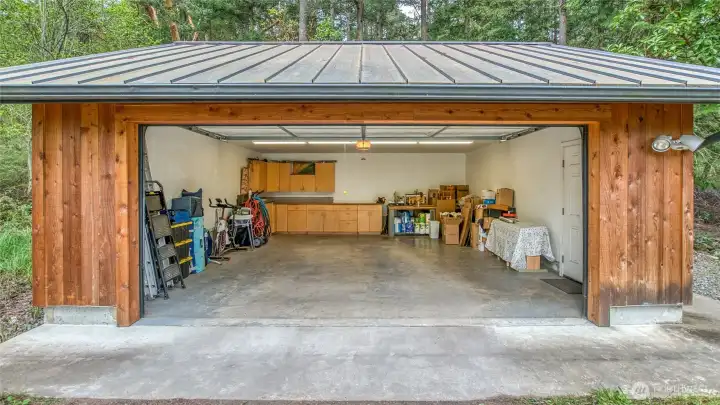 Garage has the old kitchen cabinets and counters for storage