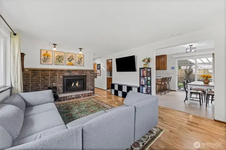 The kitchen and dining area are adjacent to the living area.