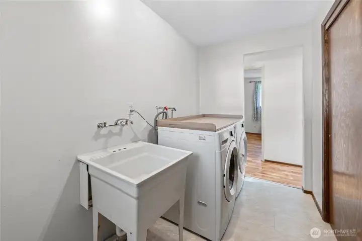 View of the utility sink and storage.