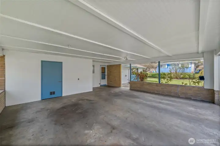 2 car covered carport with convenient homeowner entrance.