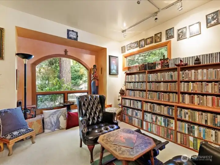 Library is a wonderful area to enjoy with large picture window looking out to the backyard and wildlife.
