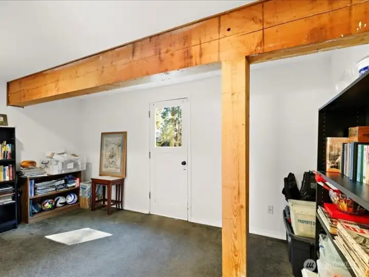 Open up wall between two rooms for one large bedroom with its own bathroom.