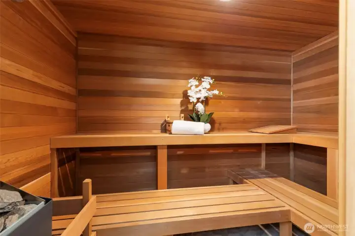 Private wood sauna with warm cedar finishes, built-in benches, and a spa-inspired atmosphere—perfect for relaxation, wellness, and elevated comfort.