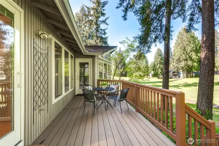 Stunning deck with golf course views and direct access from both the living room and family room, creating an effortless extension of the main living spaces.