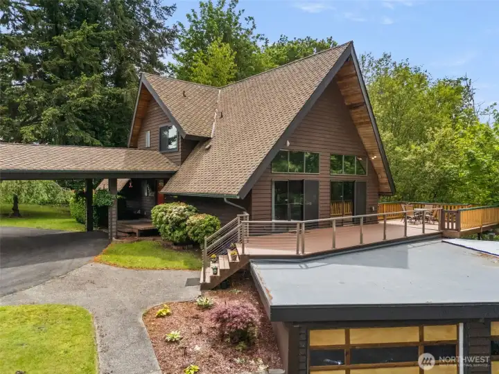 Attention style lovers... this custom home on a double lot is writing your new chapter.