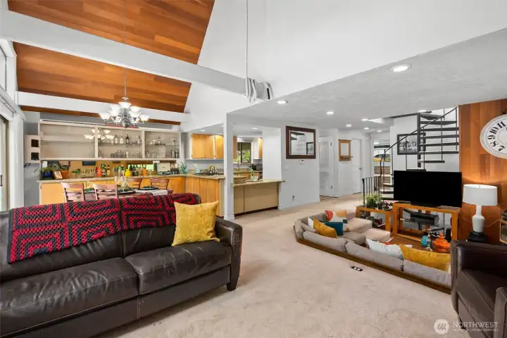Perfect entertaining flow... don't miss the soaring wood ceiling.